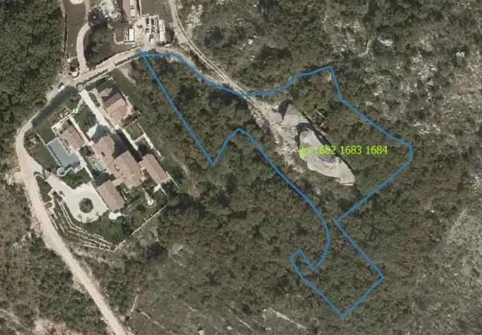 7,715 m² Land with Structures and Unfinished Construction near Sveti Stefan